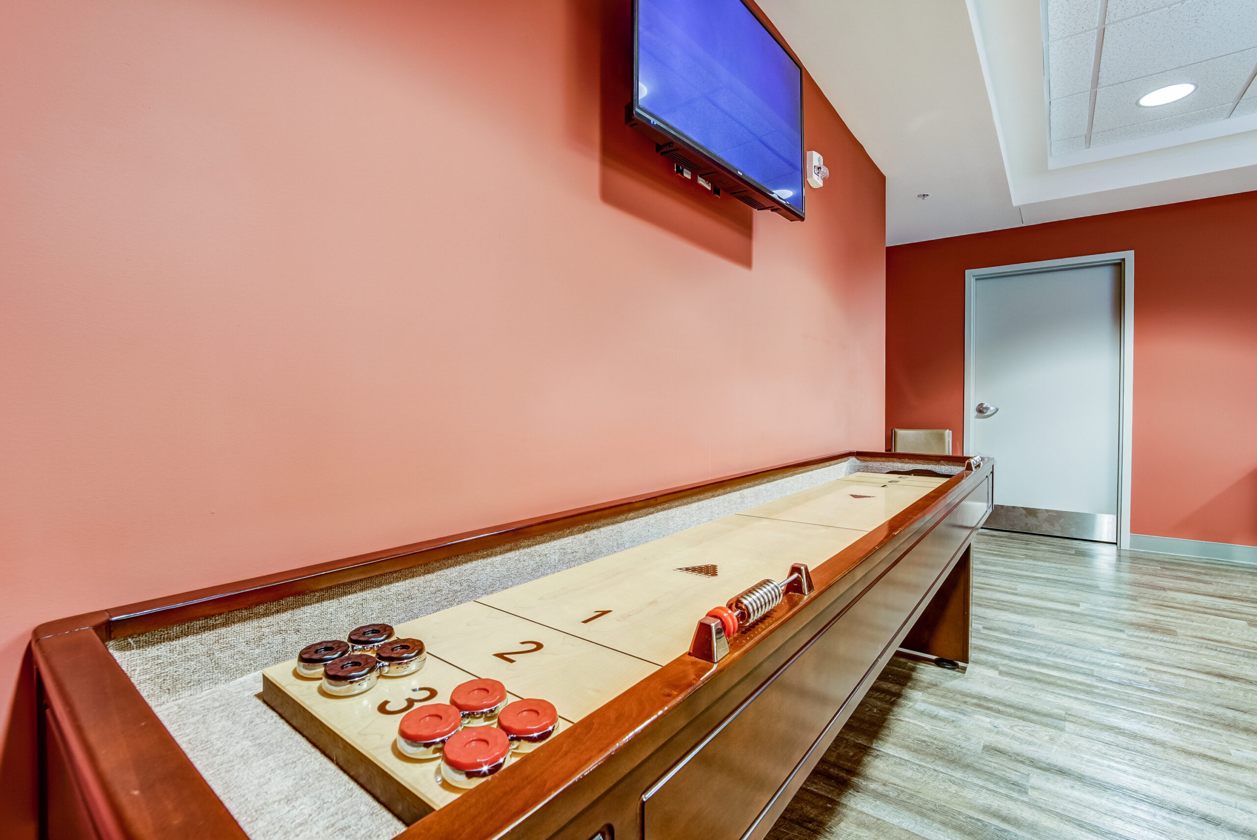 Shuffleboard in Blackfriars Pub at Oakcrossing Retirement Living