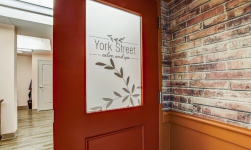 Doors of salon and spa at Oakcrossing Retirement Living