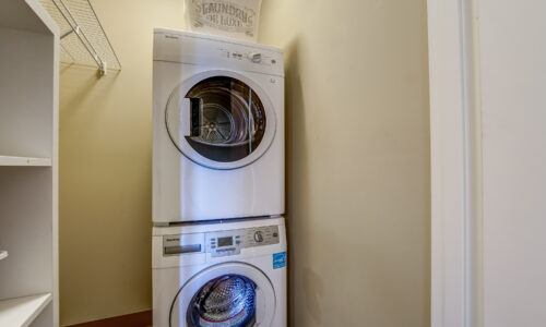 Washing machine and dryer in suite at Oakcrossing Retirement Living