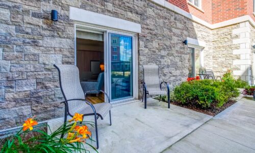 Outdoor patio of studio suite at Oakcrossing Retirement Living