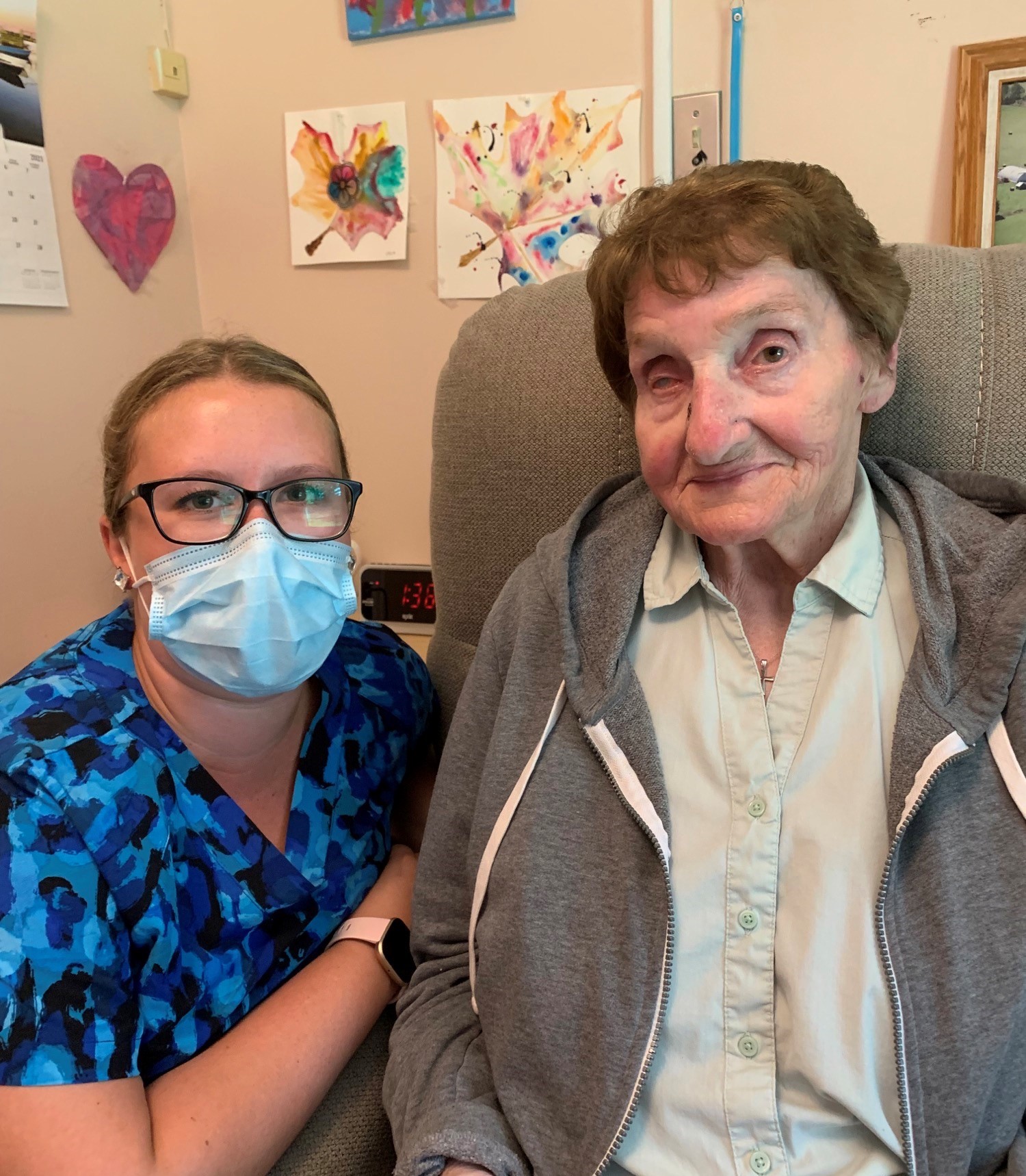 New PSW Emily sitting next to a Meaford LTC resident