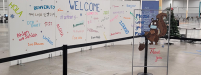 Welcome sign at the Cambridge Pinebush vaccination clinic