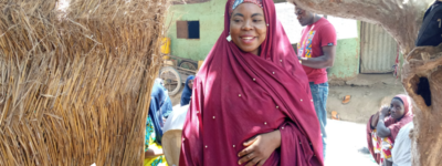 A woman smiling in Magama Gumau